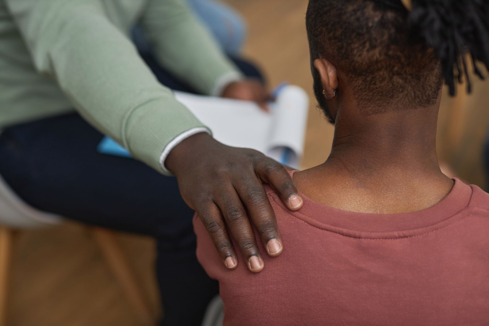 Comforting Hand On Shoulder